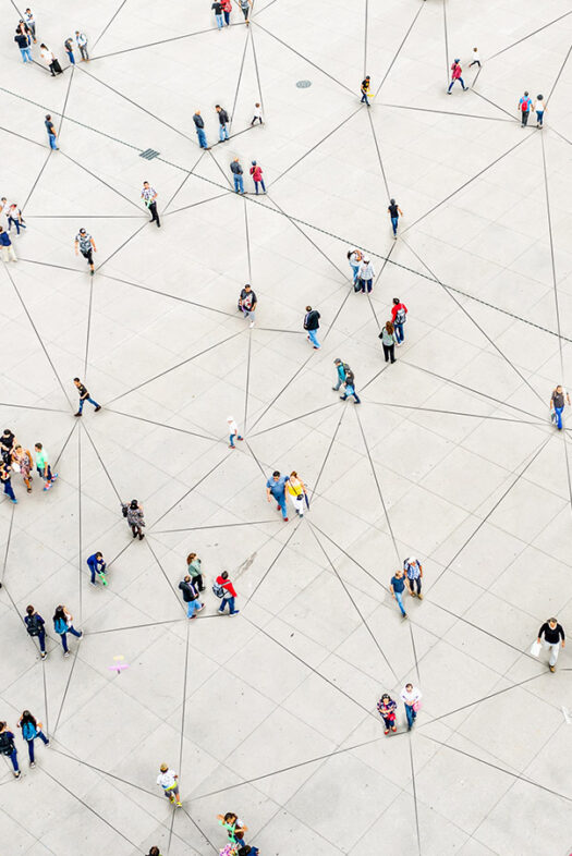 Digitised representation of several people in a square. The people are connected by a network of lines. ©istock