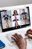 A screen depicting various people.