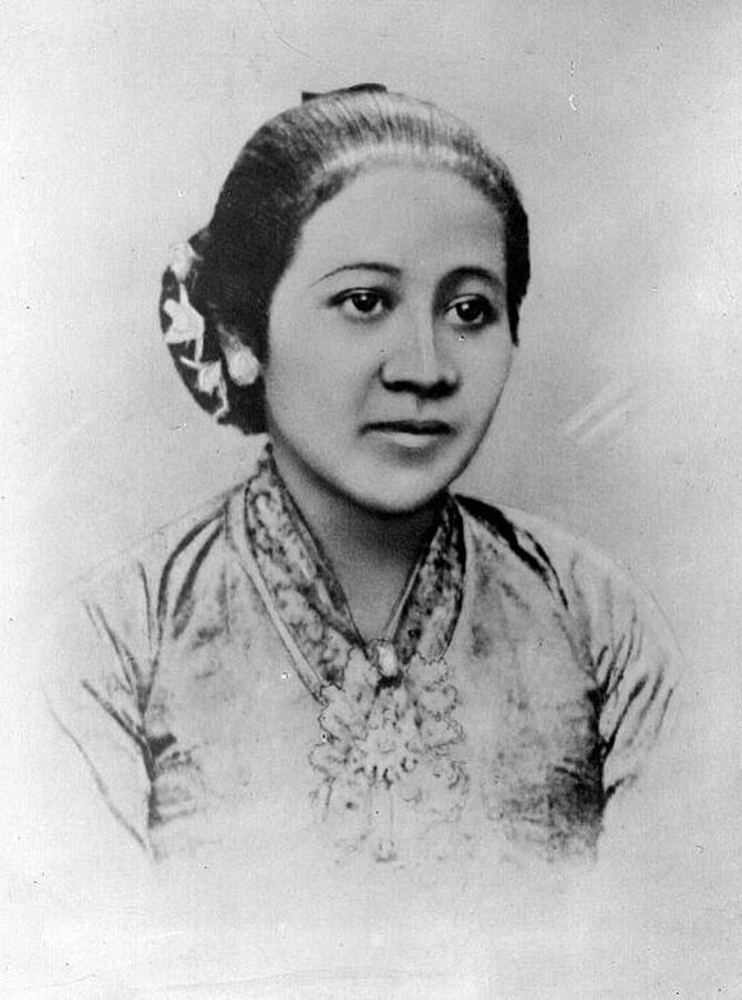 A black and white portrait of a woman.