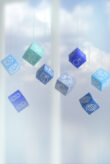 Hanging cubes with symbols of the United Nations Sustainable Development Goals (SDGs).