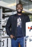 A man is standing in a laboratory