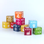 Small cubes in different colours with the global Sustainability Development Goals