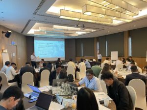Attendees working on a group exercise during one of the training sessions on digitalization