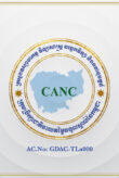 Logo of GDAC. White background with golden frame around the edge. In a large circle in the middle, we have the letters CANC in green on a pale blue map of Cambodia. Around the map are two circles with golden borders. Outside these circles, the name of the organization is written in Khmer script in dark blue. There are two gold stars on the left and right of this round border. Outside this writing is another circular gold frame. At the bottom of the image, we see: AC.No: GDAC-TLa000.