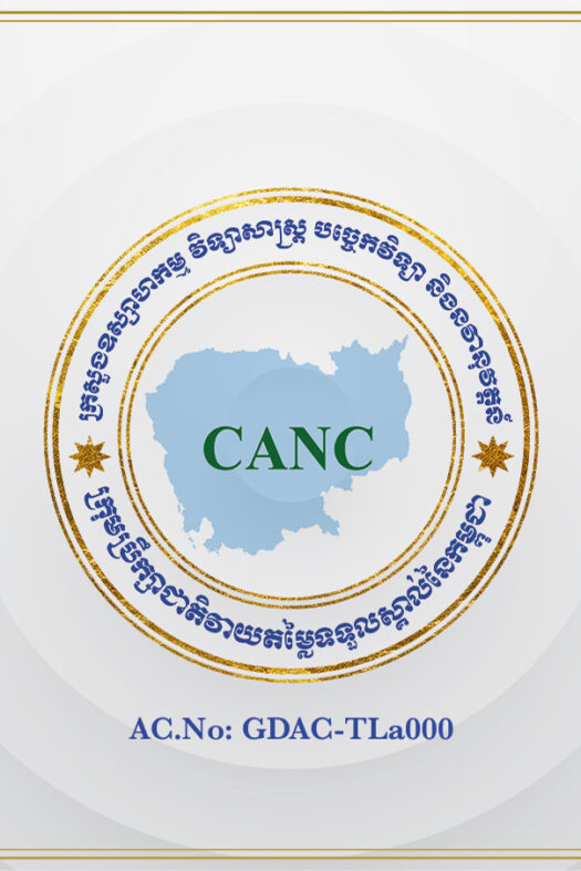 ©GDAC/PTB Logo of GDAC. White background with golden frame around the edge. In a large circle in the middle, we have the letters CANC in green on a pale blue map of Cambodia. Around the map are two circles with golden borders. Outside these circles, the name of the organization is written in Khmer script in dark blue. There are two gold stars on the left and right of this round border. Outside this writing is another circular gold frame. At the bottom of the image, we see: AC.No: GDAC-TLa000.